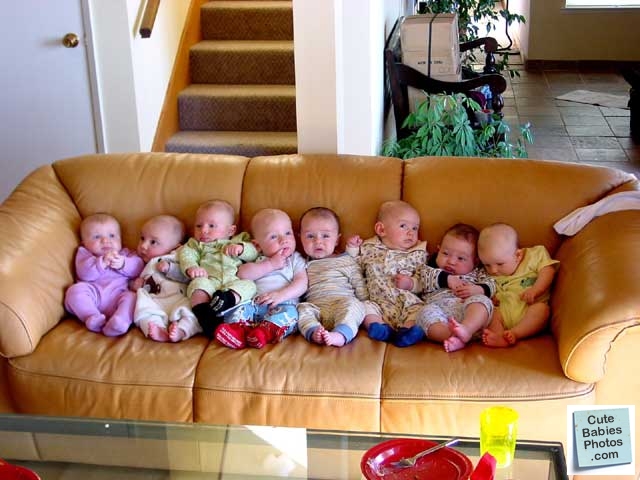 Group of babies on couch