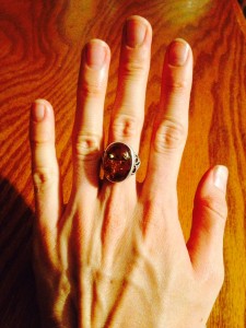 Amber ring on hand